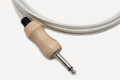 Maple 1/4-inch mono plug closeup